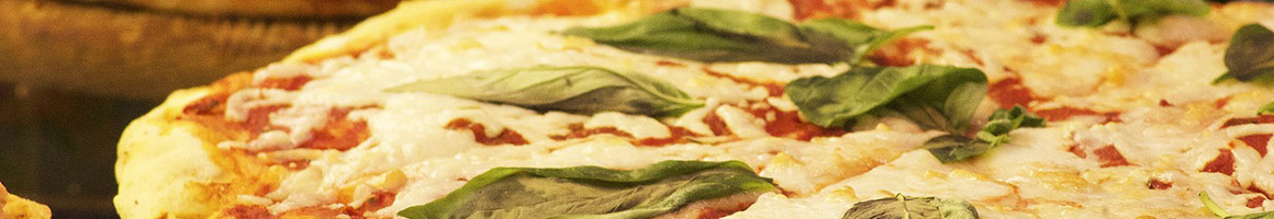 Eating Italian Pizza at PizzaMan Dan's restaurant in Port Hueneme, CA.
